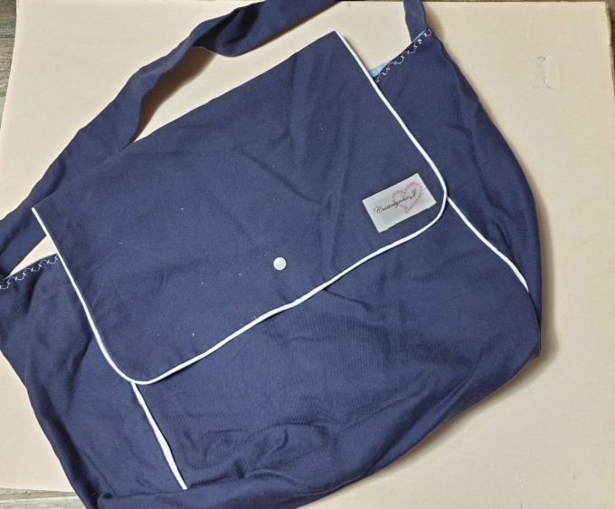 Sac à langer en coton biologique bleu , plusieurs rangements à l'intérieur 